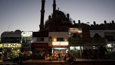 Shop owners wait for customers in the Old Market district.