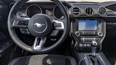 A solidly put together interior is slightly let down by Inconsistent switchwork and varying air vents. Chris Whiteoak / The National