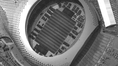 A satellite image captured on Monday, August 12, 2019, appears to show Chinese security force vehicles inside the Shenzen Bay Sports Center in the southern Chinese city of Shenzhen, bordering Hong Kong. Provided by Satellite image ©2019 Maxar Technologies via AP