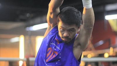 Manny Pacquiao stretches during the session. Jake Verzosa for The National
