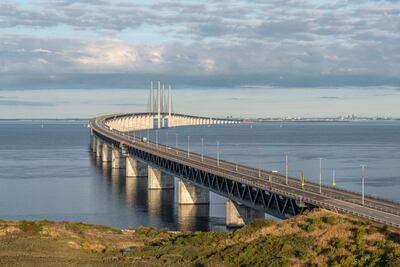A combined railway and motorway bridge across the Oresund Strait connects Copenhagen and Malmo. Photo: Per Pixel Petersson / Imagebank