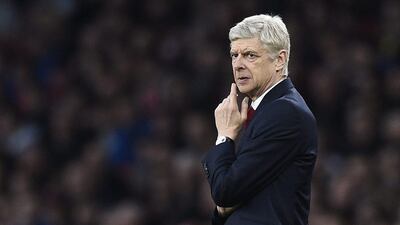 Arsenal manager Arsene Wenger shown during his team's Premier League match against Chelsea last weekend. Dylan Martinez / Reuters / January 24, 2016