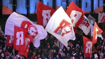 Activists of the United Russia party wave flags on People's Unity Day last year.