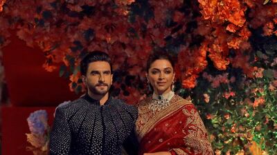 Actor Ranveer Singh and his wife actor Deepika Padukone at the engagement party. Reuters