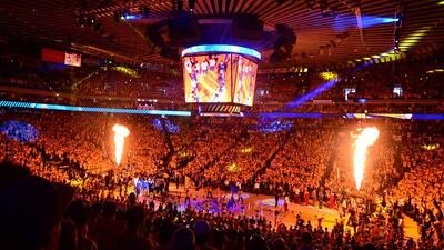 Players from the Golden State Warriors and Cleveland Cavaliers are introduced prior to the start of Game 5 of the 2015 NBA Finals on June 14, 2015 at the Oracle Arena in Oakland, California. The Warriors defeated the Cavaliers 104-91 to lead the best of seven series 3-2. AFP PHOTO / FREDERIC J. BROWN