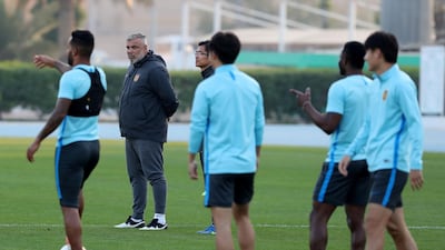 Cosmin Olaroiu watches on.