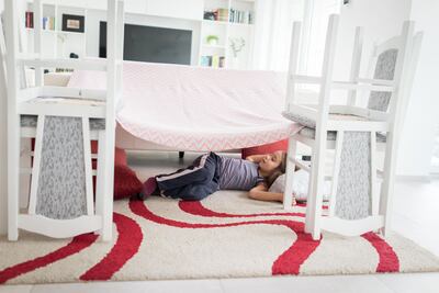 Help your children make a fort, then spend some family time in there away from screens. Getty Images