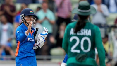 India's Smriti Mandhana, left, walks to congratulate batting partner Jemimah Rodrigues after winning the women's T20 match against Pakistan at the Commonwealth Games in Birmingham on Sunday, July 31, 2022. AP