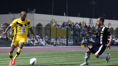 Mahmoud Abdel Razek Shikabala, left, in action for Al Wasl.