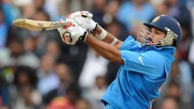 Shikhar Dhawan on his way to an unbeaten 102 against West Indies at The Oval yesterday as India advanced to the semi-finals. Philip Brown / Reuters