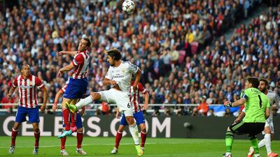 Diego Godin, second left, and Atletico Madrid became the first to break the Barcelona-Real Madrid duopoly of the Primera Liga since Rafa Benitez’s Valencia 10 years ago. (Photo by Shaun Botterill/Getty Images)