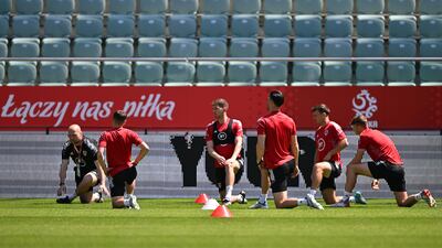 The Wales squad warm up during training for their Uefa Nations League clash with Poland on Wednesday, June 1. EPA