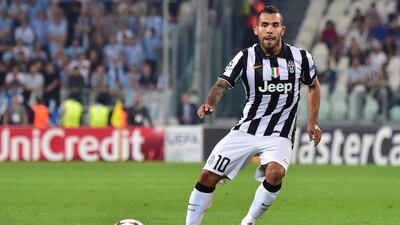 Carlos Tevez has been plying his trade with Juventus. Gerardo Martino says he will give the 30 year old another chance on the Argentina national team. Giuseppe Cacace / AFP
