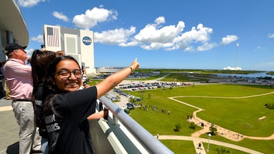 Alia Al Mansoori watches the SpaceX Falcon 9 rocket launch from Kennedy Space Center. Scott A Miller for The National