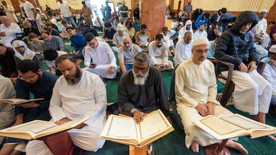 Worshippers gather for Friday prayers at Al Qasba mosque in Sharjah. Ahmed Ramzan / The National