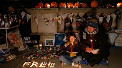 Richard Ratcliffe, husband of Nazanin Zaghari-Ratcliffe, a British-Iranian held in Iran since 2016, sitting outside the Foreign Office in London with his daughter Gabriella during his hunger strike in November. AFP