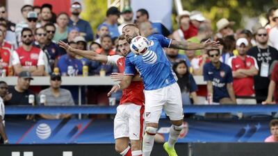 MLS All-Stars forward Clint Dempsey, right, of Seattle Sounders, is defended by Arsenal’s Calum Chambers during the second half of the MLS All-Star game Thursday, July 28, 2016, in San Jose, California. Marcio Jose Sanchez / AP Photo