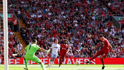 Liverpool striker Darwin Nunez fires in shot that hits post and leads to an own goal scored by Villa defender Matty Cash. Getty