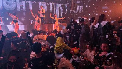 Dancers perform at a nightclub in Wuhan, China. AFP