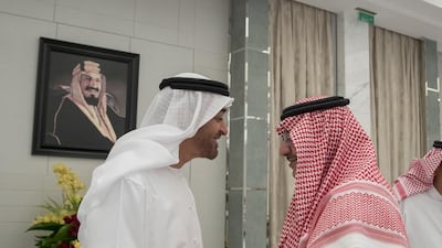 Sheikh Mohammed bin Zayed, Crown Prince of Abu Dhabi and Deputy Supreme Commander of the Armed Forces, left, greets Prince Mohammed bin Nayef bin Abdulaziz Al Saud, Crown Prince, Deputy Prime Minister, and Minister of Interior of Saudi Arabia, right. Mohamed Al Hammadi / Crown Prince Court - Abu Dhabi