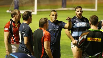 Apollo Perelini, centre, is the Shaheen coach and is entrusted with nurturing EMirati rugby talent. Pawan Singh / The National