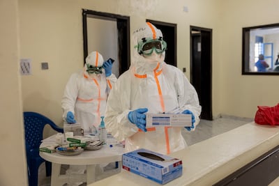 Staff wear protective equipment at a medical facility in Bunia, in the Democratic Republic of Congo. Getty Images