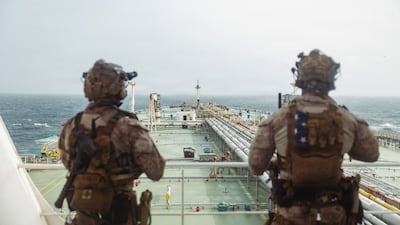 A US military picture shows Marines boarding a ship in the Gulf of Oman. Photo: Centcom