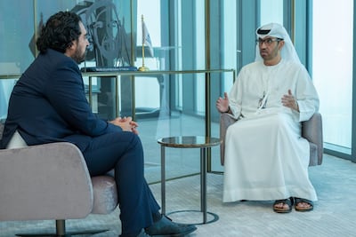 Dr Sultan Al Jaber with The National's Mustafa Alrawi.