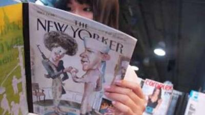 Vickie Han looks at The New Yorker magazine at a news-stand in Manhattan.