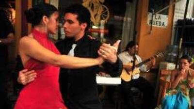 Dancing the tango in the streets of Buenos Aires.