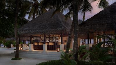 Dhoni Bar on the beach is nestled among palm trees