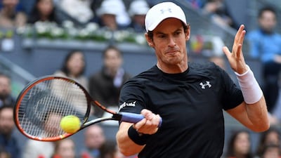 Britian’s Andy Murray returns a ball to Serbia’s Novak Djokovic during the Madrid Masters men’s tennis final at the Caja Magica (Magic Box) sports complex in Madrid on May 8, 2016. Gerard Julien / AFP