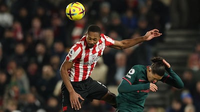 Ethan Pinnock 6: Weak header led to Jorgensen having to concede early foul and take booking for the team. Badly sliced a clearance out for corner in shaky first-half from defender. Important block on Robertson cross just after break with Liverpool lining up in box and stuck to task under second-half pressure. AFP