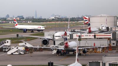 British Airways planes at Heathrow Terminal 5 in London. British Airways parent IAG said adjusted operating profit beat analyst estimates. REUTERS/Neil Hall/File Photo
