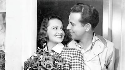 Olivia de Havilland and Dick Powell in 'Hard to Get' (1938). IMDb