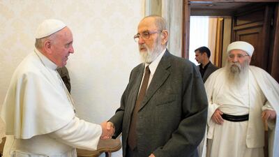 Yazidi leader Prince Tahseen Said Ali meets Pope Francis at the Vatican in January 2015. Osservatore Romano / AFP