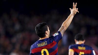 Barcelona’s Luis Suarez celebrates his third goal against Eibar in Sunday’s 3-1 La Liga triumph. Albert Gea / Reuters