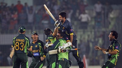 The release of pressure in a big game was evident when Pakistan got to celebrate a narrow win over arch-rivals India with the help of Shahid Afridi, centre, and man-of-the-match Mohammad Hafeez, right, on Sunday, March 2, 2014. AM Ahad / AP Photo