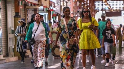Tourists at Dubai's Gold Souk. The UAE economy is bouncing back from the effects of the regional conflict. Victor Besa / The National