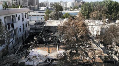 The aftermath of a fire in a house divided into sublet rooms, in Maysaloon, Sharjah. Reem Mohammed/The National