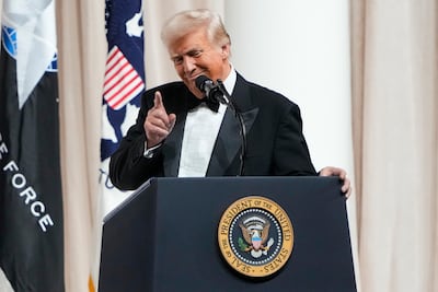 US President Donald Trump speaks at a ball after his inauguration, on January 20. AP