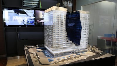 A model of the residential and hotel building The Opus by Zaha Hadid at the Omniyat Sales office in Business Bay. Pawan Singh / The National
