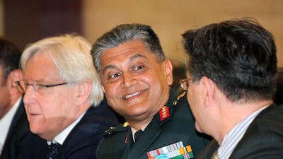 Abhijit Guha, centre, a retired Lieutenant General from the Indian Army, will be the next leader of the UN observer mission in Yemen's Red Sea port city of Hodeidah.