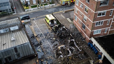 Fire services monitor the scene after four Hatzolah ambulances were set on fire next to Machzike Hadath Synagogue, in London, England. The Metropolitan Police said they are treating the incident as an anti-Semitic hate crime. Getty Images
