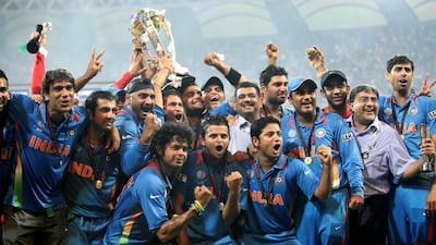 Indian cricketers pose with the trophy after victory in the Cricket World Cup final over Sri Lanka at The Wankhede Stadium in Mumbai in 2011. Getty Images
