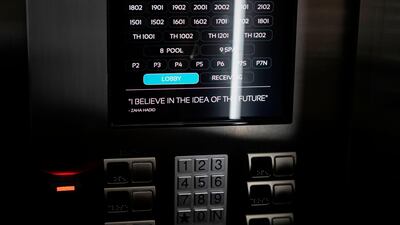 The elevator control panel reads "I believe in the idea of the future - Zaha Hadid". AFP