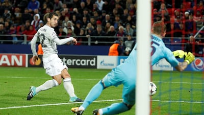 Manchester United's Henrikh Mkhitaryan scores their fourth goal. John Sibley / Reuters