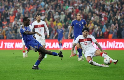 Michael Kayode, left, capped an impressive display with Italy's third goal against Turkey. Reuters