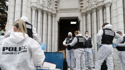 Forensic specialists inspect the scene. EPA