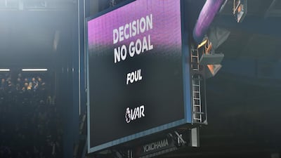 The big screen displays the decision after a VAR review, disallowing a goal from Chelsea's French defender Kurt Zouma for a foul in the build-up. AFP